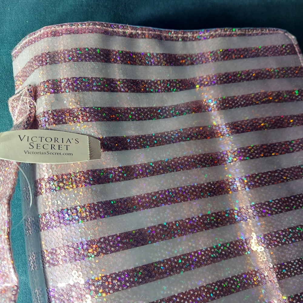 Victoria secret cosmetic bag pink shine pretty cool. Multi-pockets  NWT44.50$